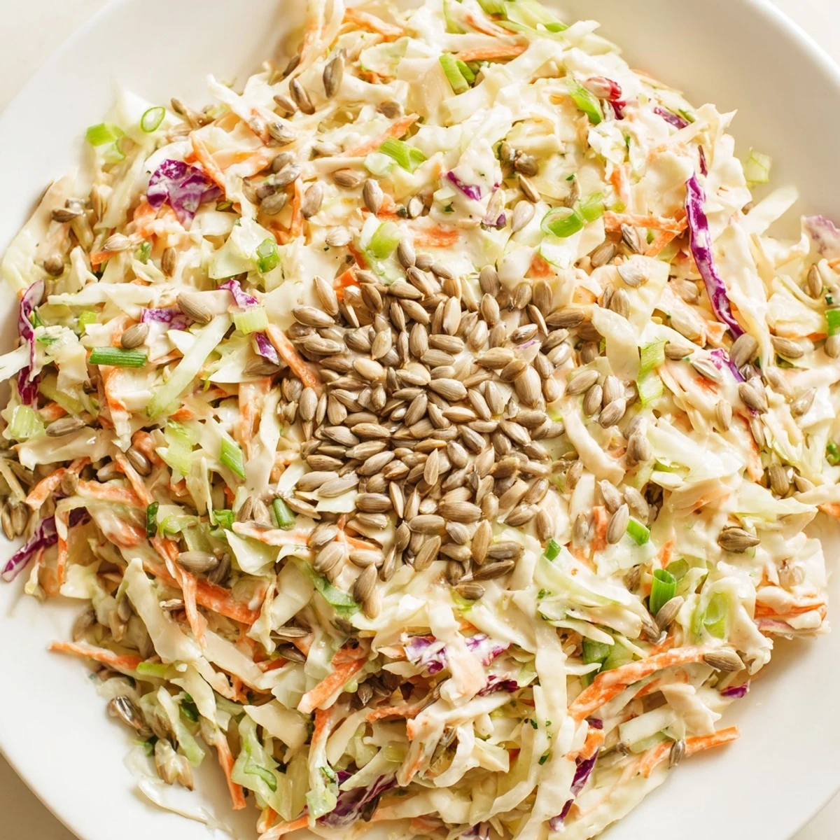 Vibrant bowl of fresh Crunchy Coleslaw Salad, ready to serve as a flavorful side dish.