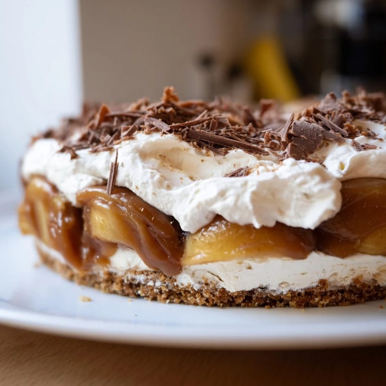 Delightful layers of caramelized apples and bananas in a buttery dessert pie.  