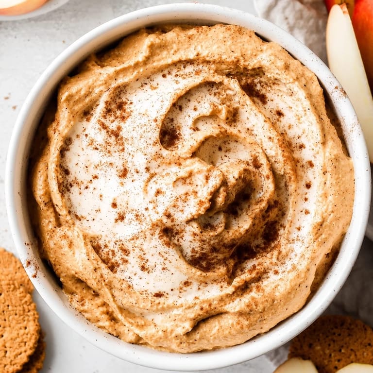 Fluffy pumpkin coffee whip dip featuring autumn spices, ideal with graham crackers.