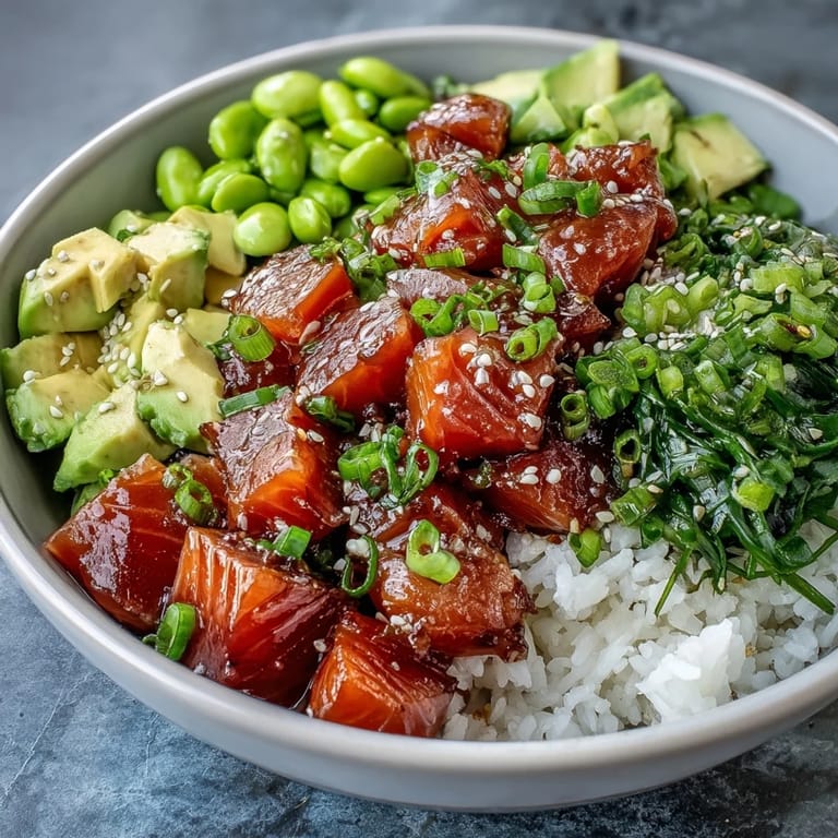 Delectable Salmon Poke Bowl, showcasing beautiful raw salmon and crisp toppings.